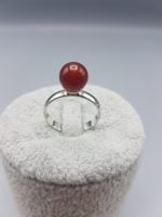 A solitaire ring of red carnelian.