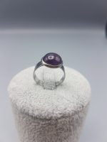 Round purple amethyst ring in sterling silver.