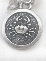 MEN'S BRACELET IN SILVER WITH MOONSTONE AND BLACK ONYX WITH CANCER PENDANT.