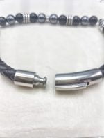 A BRACCIALE UOMO CON ONICE NERA ED EMATITE CON CORDINO IN CUOIO con fermaglio in argento.