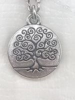 KEYCHAIN NECKLACE WITH TREE OF LIFE AND SEVEN CHAKRA COLORS with swirls.