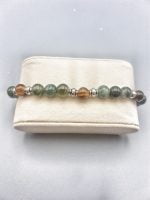 A BRACCIALE UOMO AGATA MUSCHIATA E OCCHIO DI TIGRE con perline verdi, marroni e argento.