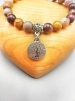 A bracelet with a tree of life pendant.
