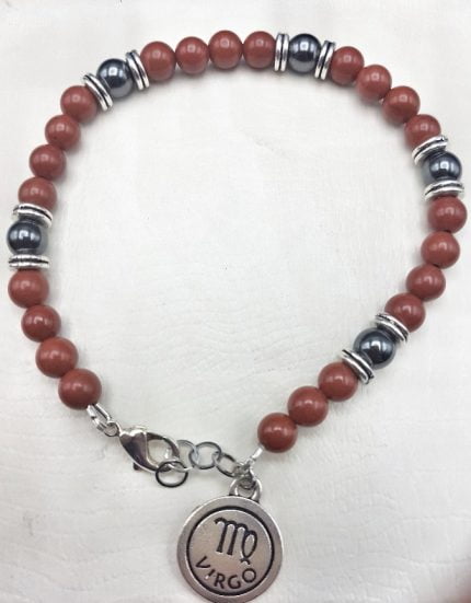 A BRACCIALE UOMO DI DIASPRO ROSSO ED EMATITE CON CIONDOLO DELLA VERGINE.