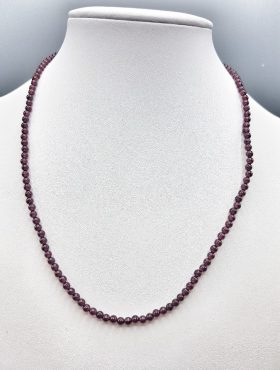 GARNET CHOKER on a mannequin.
