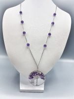 AN AMETHYST TREE OF LIFE NECKLACE on a mannequin.