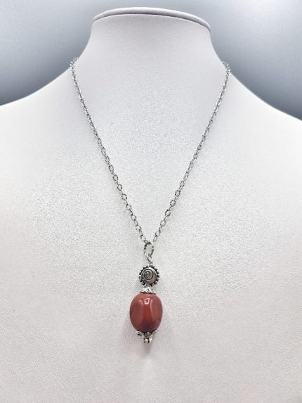 A necklace with a RED JASPER PENDANT.