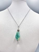 A green STONE AMAZONITE PENDANT necklace.