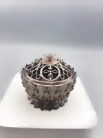 A box BURNS INCENSE DORJE SMALL FLOWER on a white surface.