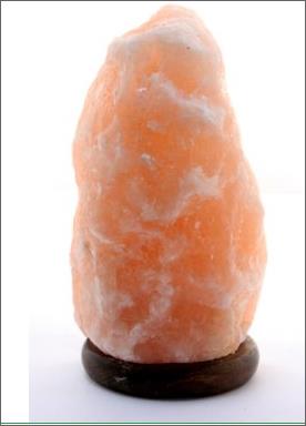 A HIMALAYAN SALT LAMP 3/6 KG with wooden base.