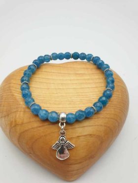 An ANGELITE BRACELET bracelet with beads and a silver angel pendant.