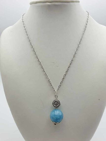 A necklace with a blue stone and a silver chain, featuring a SPHERICAL ANGELITE PENDANT.