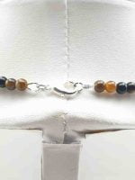 A mannequin wears a 4mm Men's Tiger's Eye and Black Onyx Necklace.