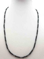 A MEN'S NECKLACE WITH BLACK ONYX AND HEMATITE 2 MM with black onyx and hematite pearls on mannequin.