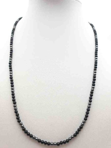 A MEN'S NECKLACE WITH BLACK ONYX AND HEMATITE 2 MM with black onyx and hematite pearls on mannequin.