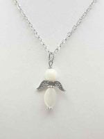 A mother-of-pearl angel pendant on a silver chain.