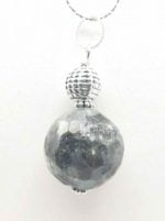 A LABRADORITE PENDANT PENDANT.