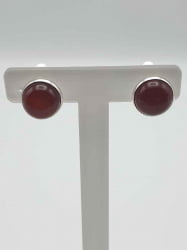 Pair of CLIP-ON EARRINGS WITH RED CARNELIAN on white support.