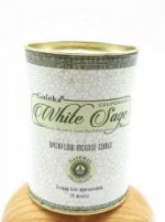 A jar of candles GOLOKA INCENSE WHITE SAGE IN CONES.