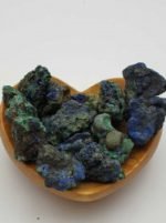 A wooden bowl filled with CRUDE MALACHITE AZURITE stones.