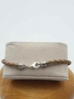 A BRACCIALE UOMO CON SODALITE, OCCHIO DI TIGRE E CORDINO CUOIO MARRONE CHIARO con chiusura in argento.