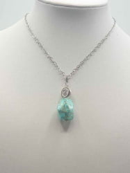 An imperial jasper pendant pendant with an imperial jasper stone.