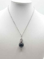 Necklace with BLACK TOURMALINE BALL PENDANT PENDANT and chain pendant in sterling silver.