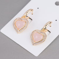 A pair of earrings BRONZE EARRINGS WITH ZIRCONS AND CAT'S EYE HEART.