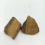 Two pieces of NATURAL RAW GOLDEN TIGER'S EYE on a white background.
